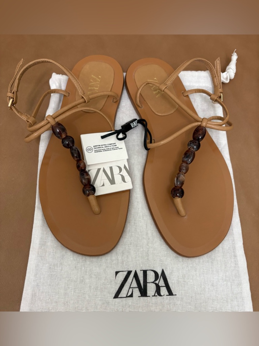 ZARA Tan Leather Beaded T-Strap Sandals
6.5 (37) NWT